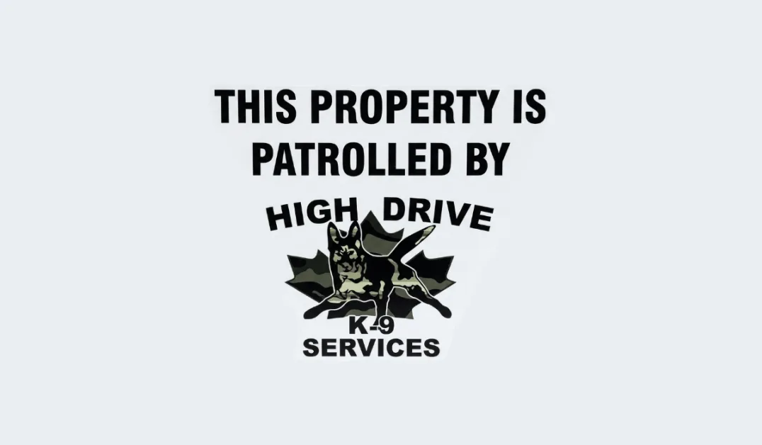 High Drive K-9 security patrol sign on facility fence